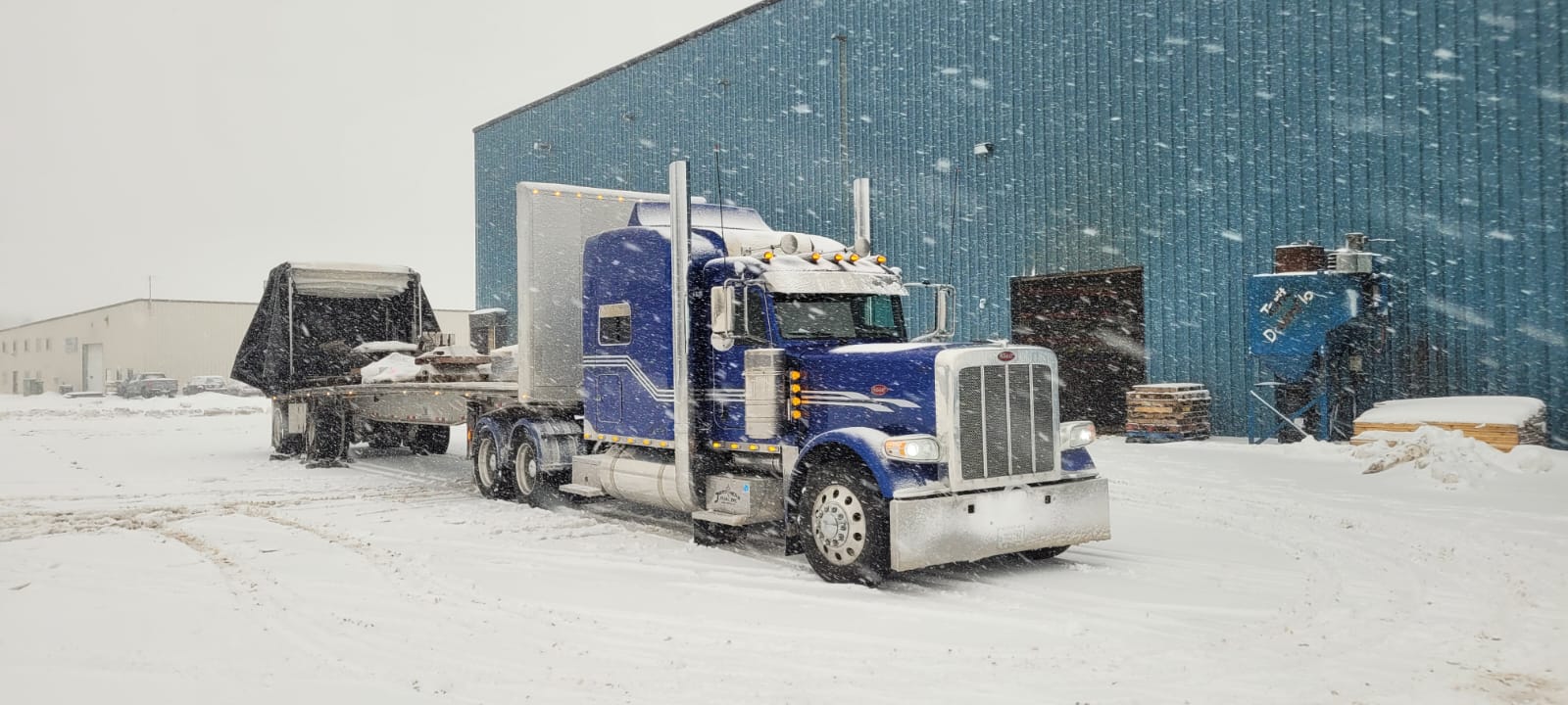 Black Peterbilt with cargo